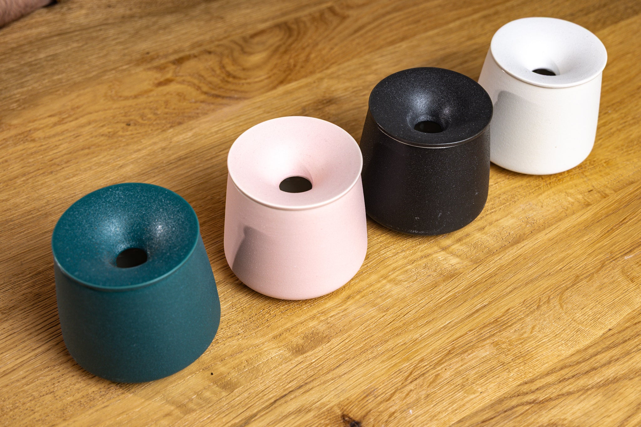 Ceramic AVB ashtray being used to empty dry herb vape chamber