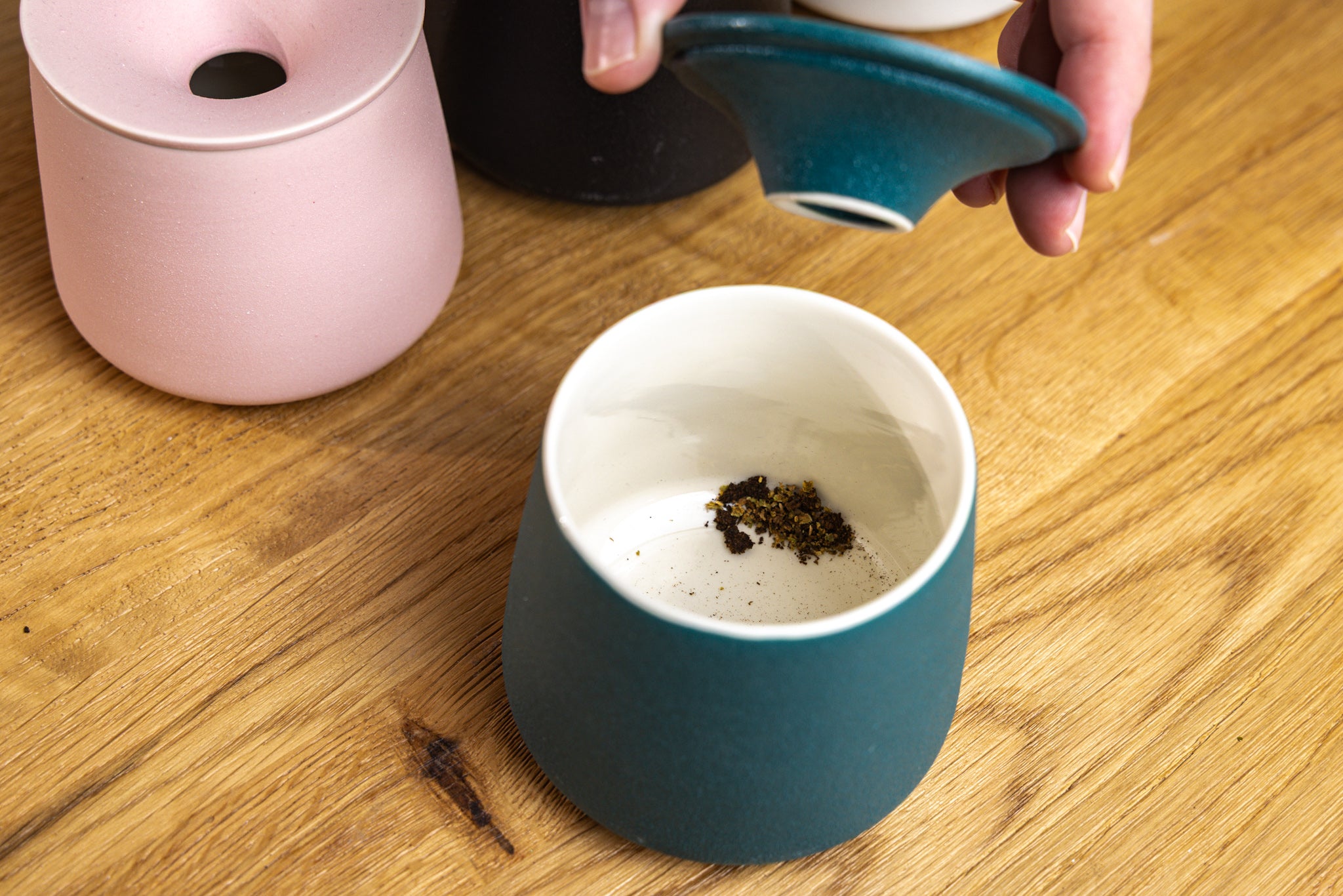 Ceramic AVB ashtray being used to empty dry herb vape chamber